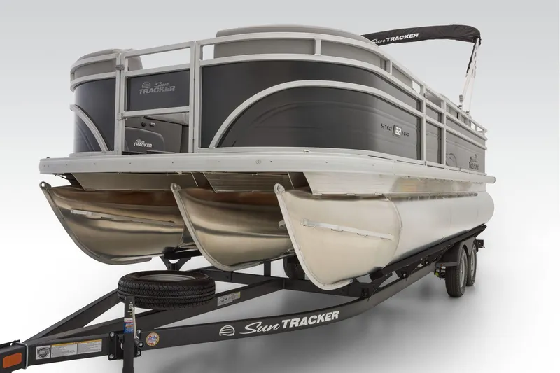 Slide: The Image of 2026 Sun Tracker SportFish 22 XP3 pontoon boat with gray seating and modern design. - 39