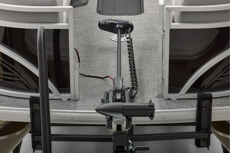 Slide: The Image of 2026 Sun Tracker SportFish 22 XP3 pontoon boat interior with gray seating and helm. - 43