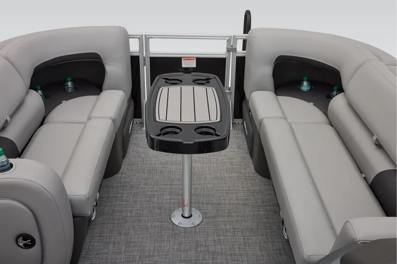 Slide: The Image of 2026 Sun Tracker SportFish 22 XP3 boat interior with steering wheel and seating. - 46