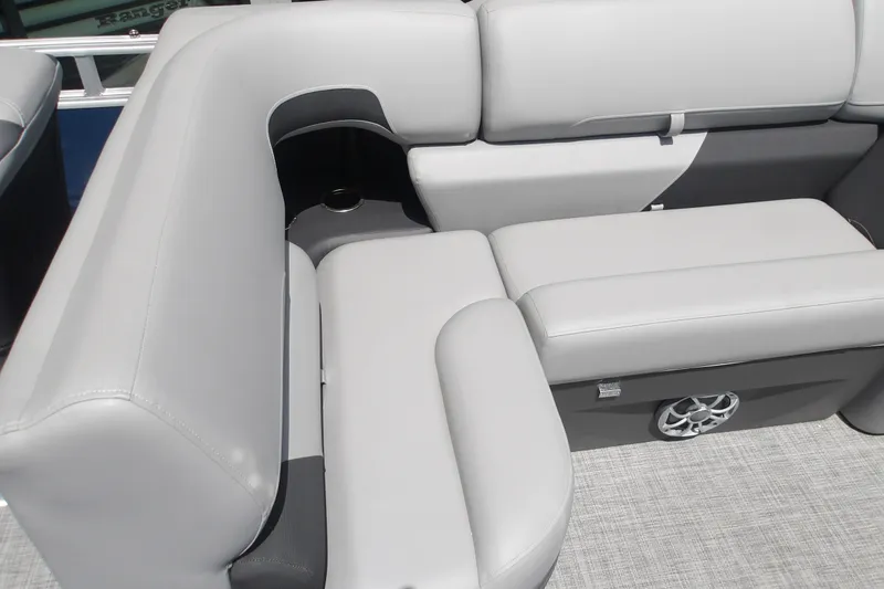 Slide: The Image of Luxurious seating on 2026 Sun Tracker SportFish 22 XP3 pontoon boat, featuring sleek gray upholstery. - 46