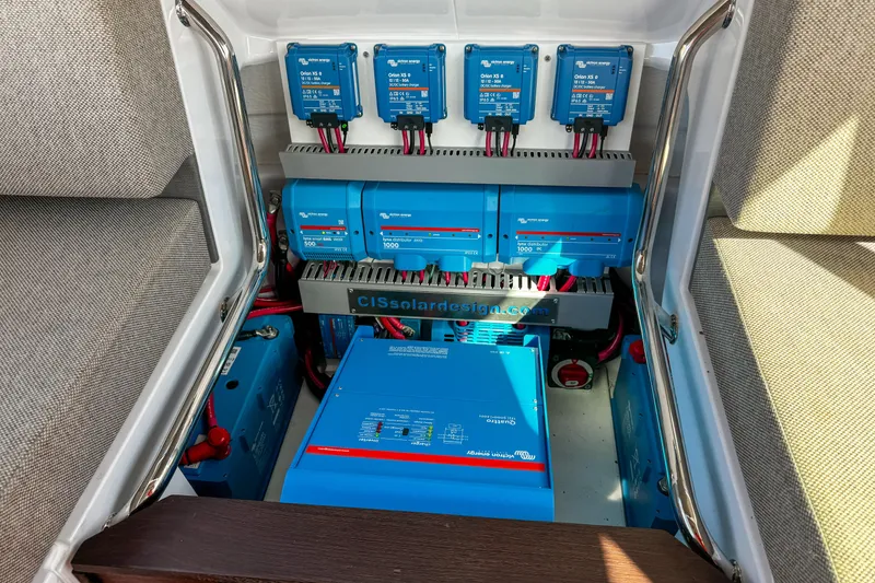 Slide: The Image of Electrical system setup in 2024 Axopar 37XC CROSS CABIN boat, featuring Victron Energy components. - 22