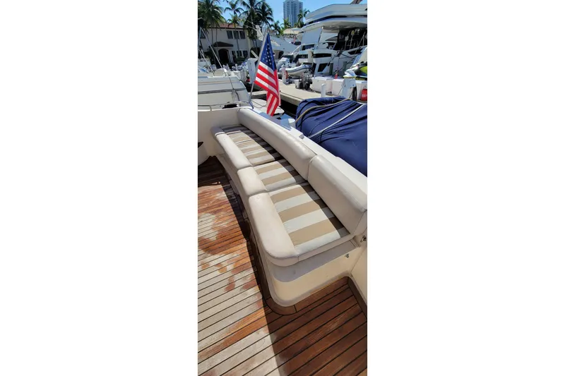 Slide: The Image of Cockpit of 1998 Viking Princess 50 Sport Cruiser with steering wheel and navigation controls. - 11