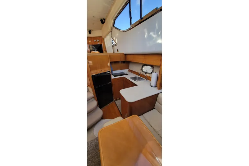 Slide: The Image of Luxurious cabin interior of 1998 Viking Princess 50 Sport Cruiser with cozy bedding. - 34