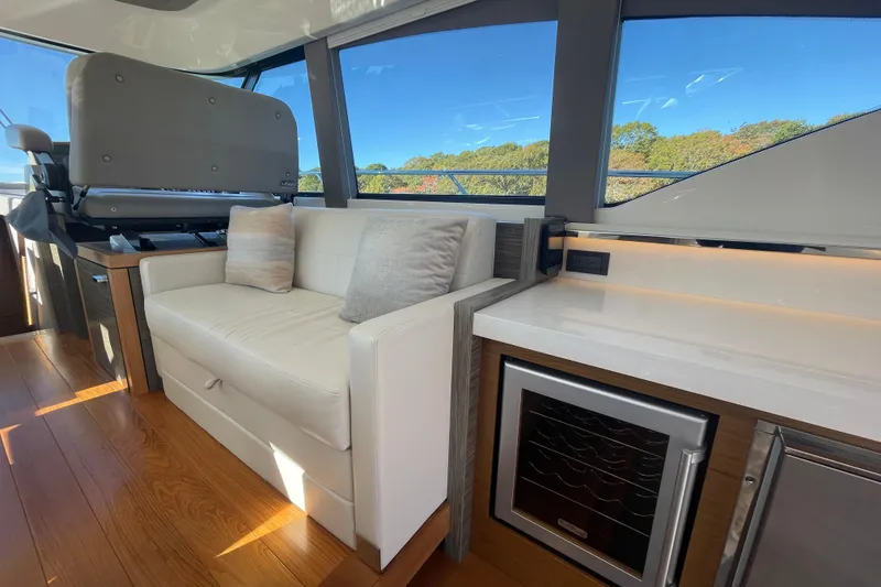 Slide: The Image of Luxurious interior of 2020 Tiara 53C yacht with plush seating and modern amenities. - 16