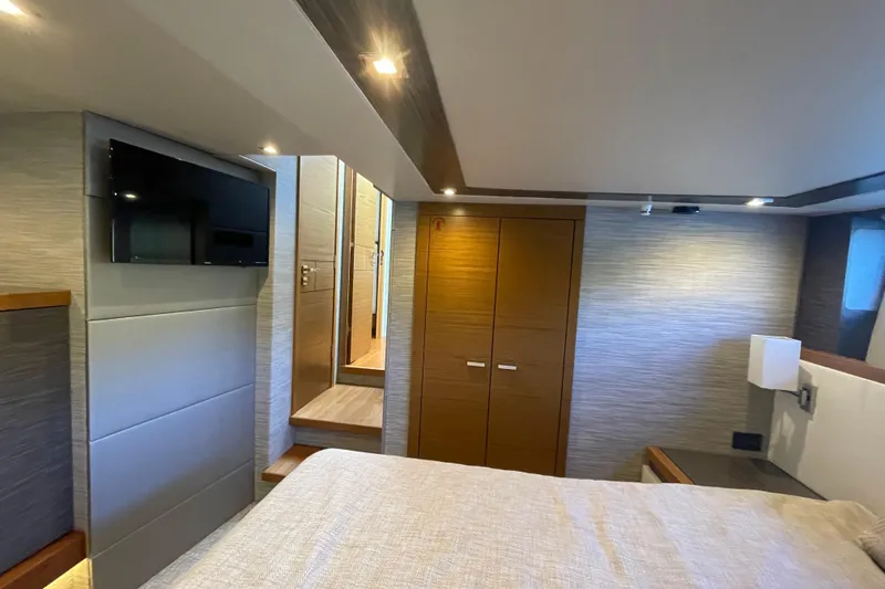 Slide: The Image of Luxurious interior of 2020 Tiara 53C yacht with modern design and cozy bedroom. - 35