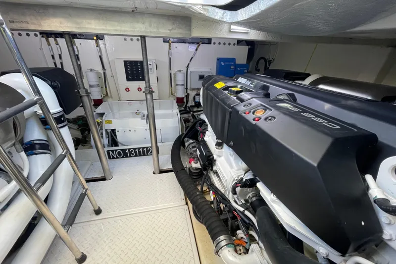 Slide: The Image of Engine room of a 2020 Tiara 53C yacht, showcasing advanced machinery and equipment. - 45