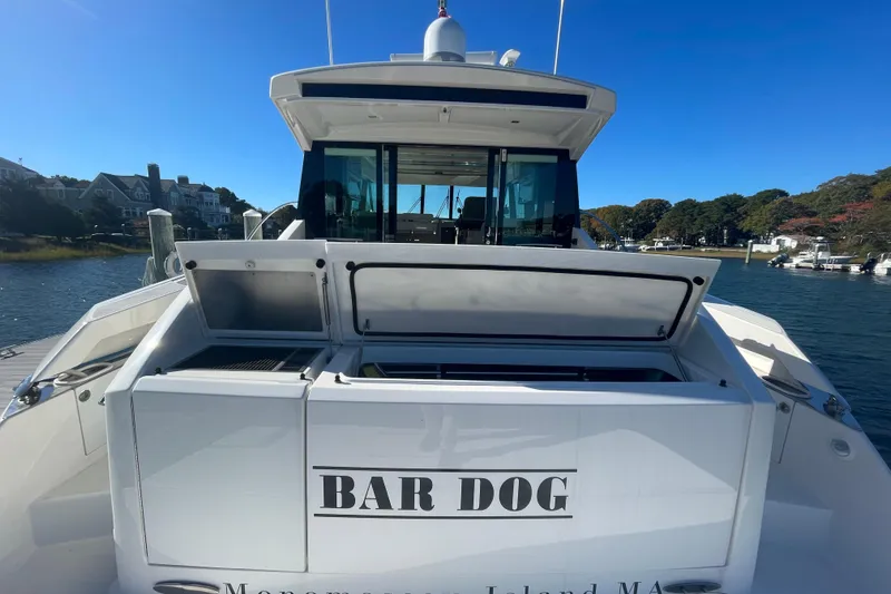 Slide: The Image of Tiara 53C 2020 yacht "Bar Dog" docked at Manomassett Island, MA. - 7