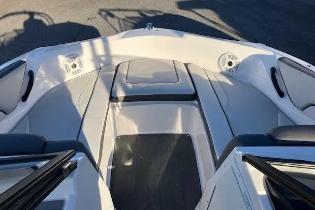 Slide: The Image of 2023 Yamaha Boats AR190 interior with seating and speakers, showcasing modern design. - 3