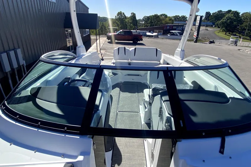 Slide: The Image of 2026 Four Winns H6 boat interior with sleek design and modern features. - 16