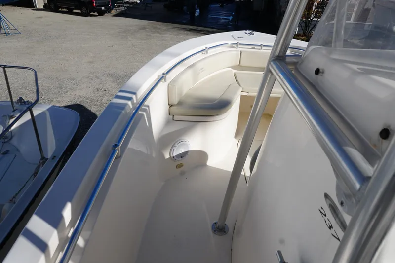 Slide: The Image of 2019 Cobia 237 Center Console boat interior with seating and railings. - 15
