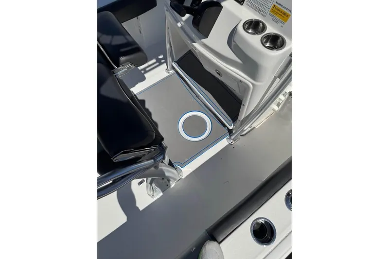 Slide: The Image of 2018 Sea Fox 206 Commander boat interior with seating and cup holders. - 15