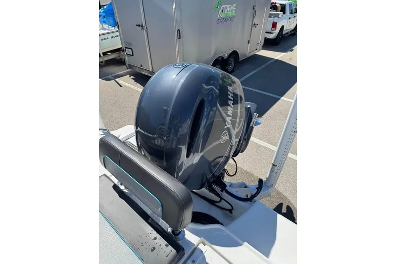 Slide: The Image of 2018 Sea Fox 206 Commander with Yamaha outboard motor in a parking lot. - 8