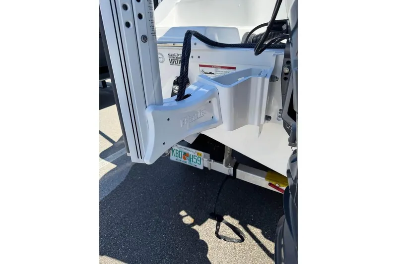 Slide: The Image of 2018 Sea Fox 206 Commander boat detail with mounted accessory and Florida license plate. - 9