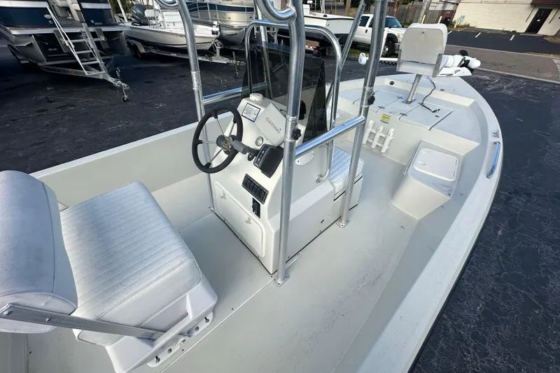 Slide: The Image of 2016 Stott Craft SCV202 boat interior with steering console and seating. - 8