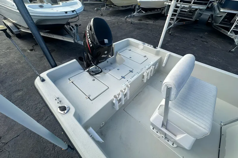 Slide: The Image of 2016 Stott Craft SCV202 boat interior with Suzuki outboard motor and seating. - 9
