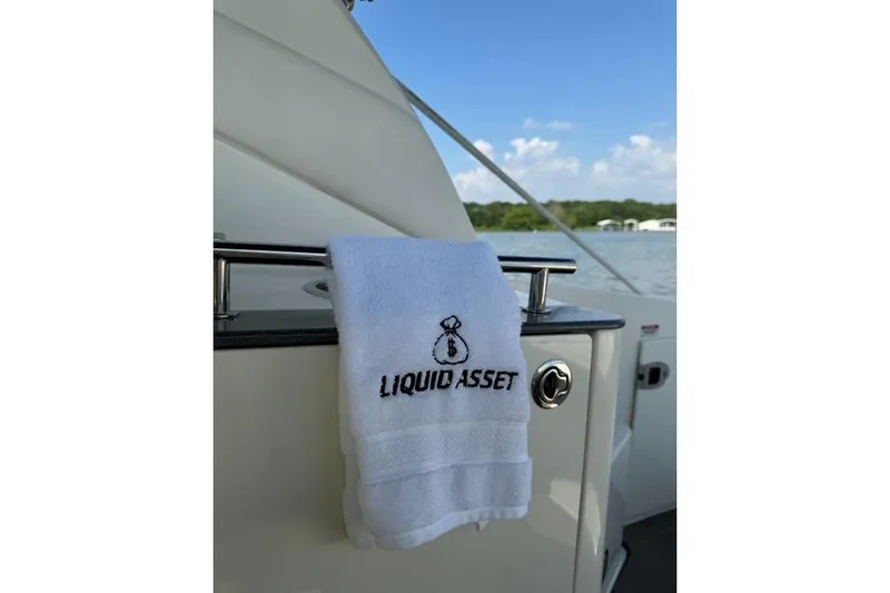 Slide: The Image of Towel on 2012 Sea Ray 260 Sundancer boat with "Liquid Asset" embroidery. - 8