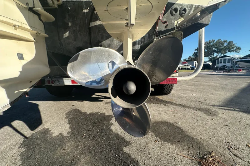 Slide: The Image of Close-up of a 2001 Boston Whaler 23 Conquest boat propeller on a trailer. - 17