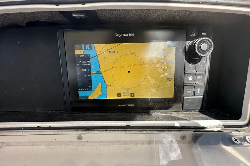 Slide: The Image of Raymarine navigation system on 2001 Boston Whaler 23 Conquest boat dashboard. - 38