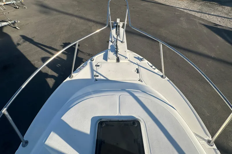 Slide: The Image of 2001 Boston Whaler 23 Conquest boat deck with railing, viewed from above. - 62