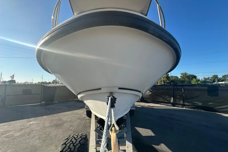 Slide: The Image of 2001 Boston Whaler 23 Conquest boat on trailer, viewed from the front. - 7