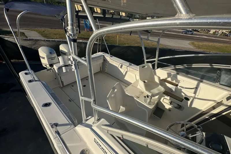 Slide: The Image of 2001 Boston Whaler 23 Conquest boat interior with seating and controls. - 75