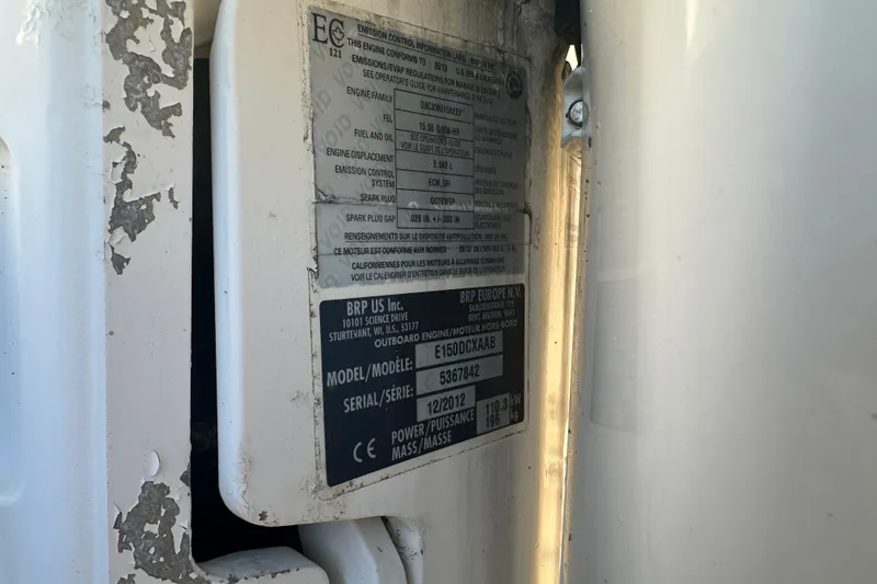 Slide: The Image of Close-up of engine label on 2001 Boston Whaler 23 Conquest boat. - 93