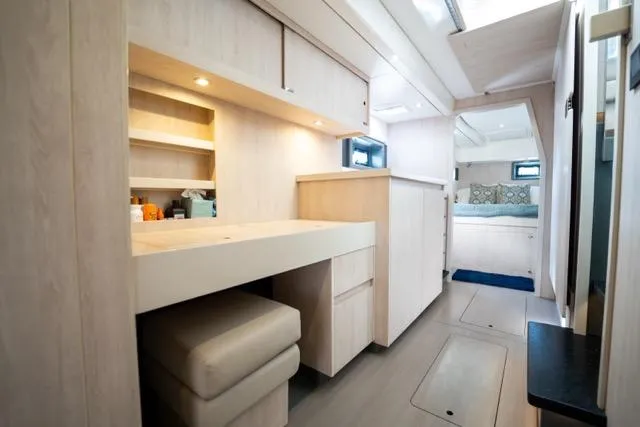 Slide: The Image of Luxurious interior of 2017 Leopard 51 Powercat yacht with modern furnishings and ample storage. - 107