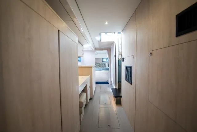 Slide: The Image of Interior view of 2017 Leopard 51 Powercat yacht with modern, light wood finishes. - 108