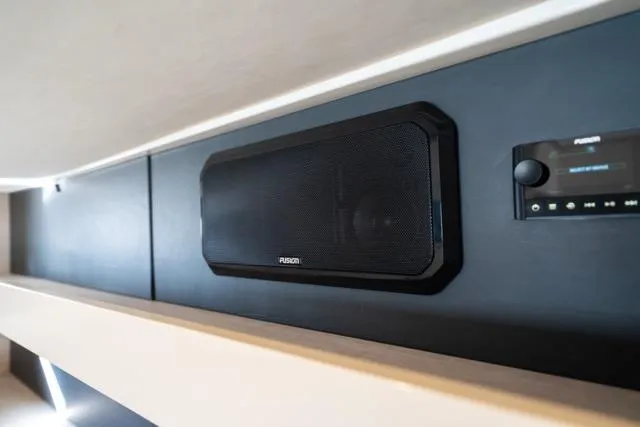 Slide: The Image of Fusion audio system on 2017 Leopard 51 Powercat yacht interior. - 111