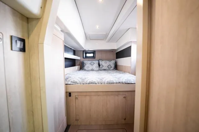 Slide: The Image of Cabin interior of 2017 Leopard 51 Powercat with cozy bed and modern design. - 123