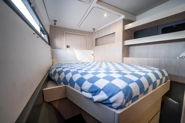 Slide: The Image of Cozy bedroom in 2017 Leopard 51 Powercat with checkered bedding and modern design. - 132