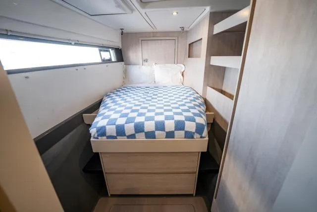 Slide: The Image of Cozy bedroom in 2017 Leopard 51 Powercat with checkered bedding and modern design. - 133