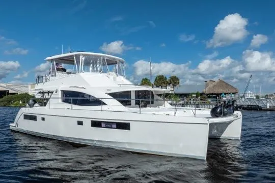 Slide: The Image of 2017 Leopard 51 Powercat yacht on water under blue sky. - 136