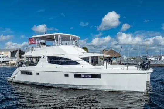 Slide: The Image of 2017 Leopard 51 Powercat yacht on water under blue sky with clouds. - 137