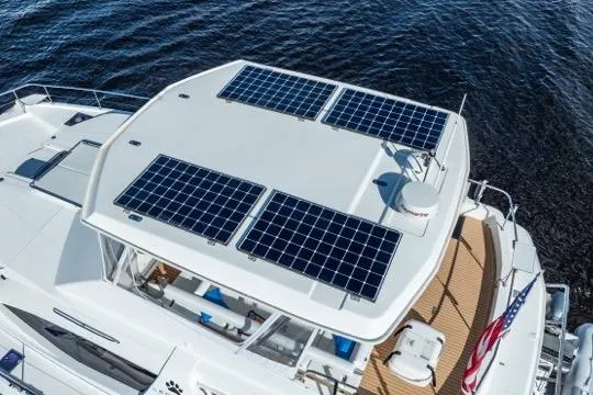 Slide: The Image of 2017 Leopard 51 Powercat with solar panels on deck, cruising on water. - 151