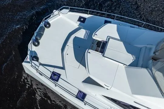 Slide: The Image of 2017 Leopard 51 Powercat yacht deck, featuring sleek design and spacious layout on the water. - 152