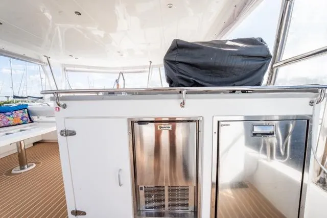 Slide: The Image of Outdoor kitchen area on a 2017 Leopard 51 Powercat yacht with stainless steel appliances. - 23