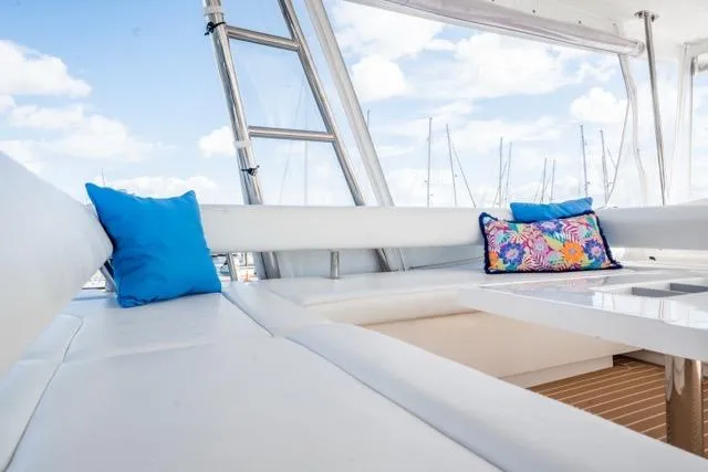 Slide: The Image of Luxurious seating area on 2017 Leopard 51 Powercat with vibrant cushions and marina view. - 30
