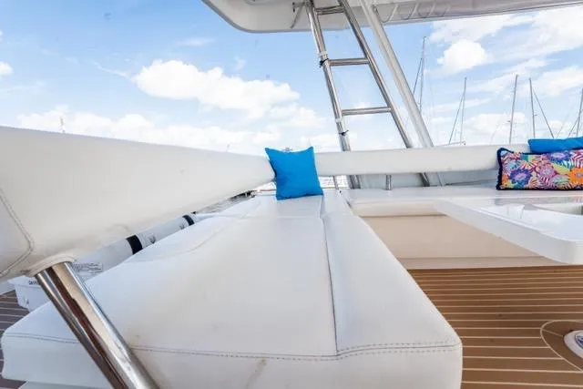 Slide: The Image of Luxurious seating on 2017 Leopard 51 Powercat yacht with blue and floral cushions. - 31