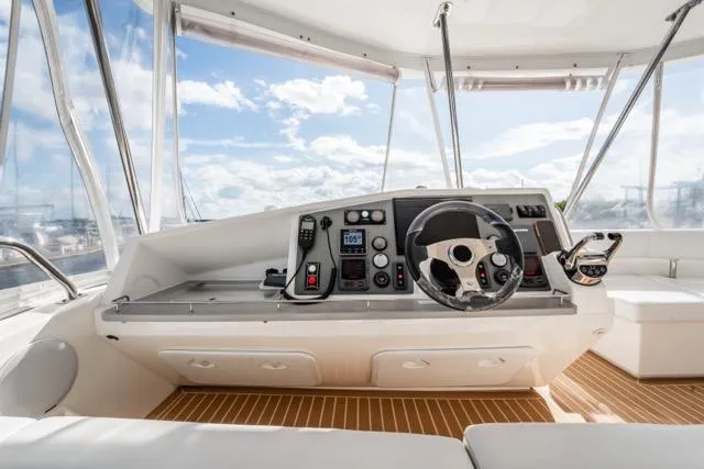 Slide: The Image of Helm of 2017 Leopard 51 Powercat with modern controls and panoramic view. - 38