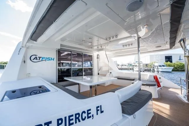 Slide: The Image of 2017 Leopard 51 Powercat yacht with spacious deck, docked in Fort Pierce, Florida. - 66