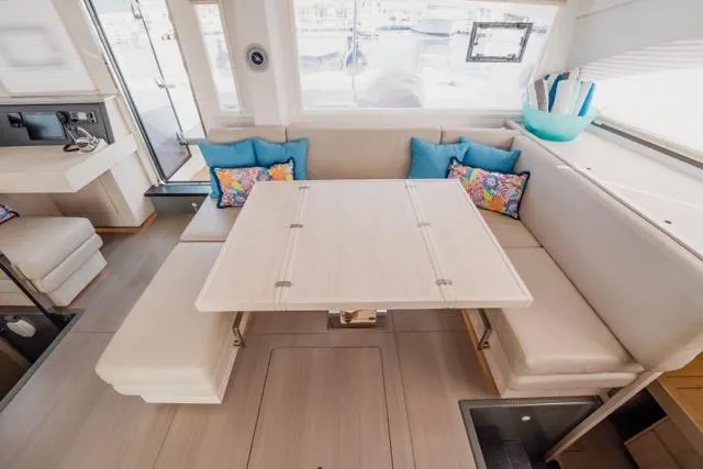 Slide: The Image of Luxurious interior of 2017 Leopard 51 Powercat with elegant seating and vibrant cushions. - 71