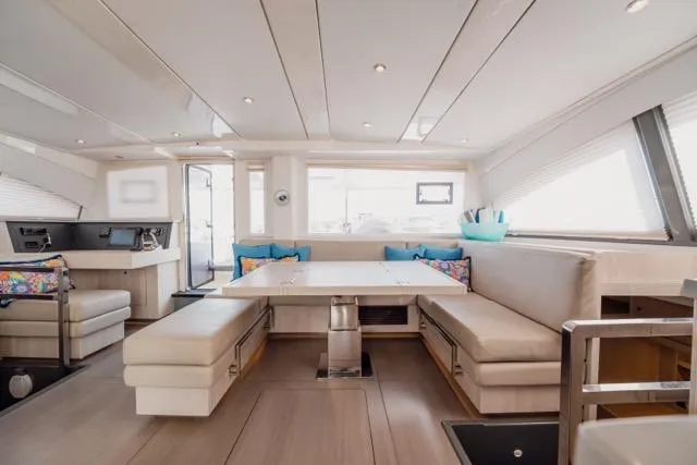 Slide: The Image of Luxurious interior of 2017 Leopard 51 Powercat yacht with modern seating and dining area. - 73