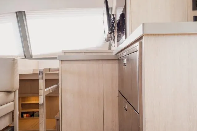 Slide: The Image of Interior of 2017 Leopard 51 Powercat yacht with modern cabinetry and seating. - 74