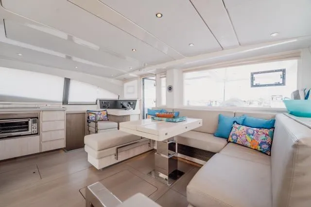 Slide: The Image of Luxurious interior of 2017 Leopard 51 Powercat with modern seating and vibrant cushions. - 87