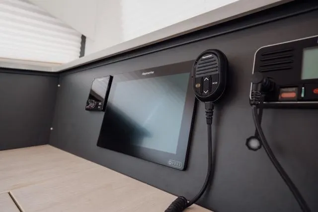 Slide: The Image of Control panel of 2017 Leopard 51 Powercat featuring navigation and communication equipment. - 92