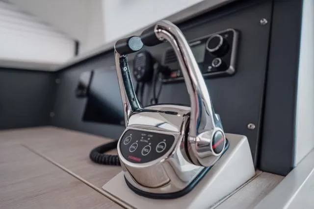 Slide: The Image of Throttle control on 2017 Leopard 51 Powercat yacht dashboard, featuring modern navigation equipment. - 94