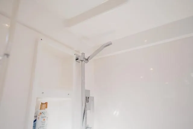 Slide: The Image of Shower area in 2017 Leopard 51 Powercat yacht, featuring modern fixtures and sleek design. - 99