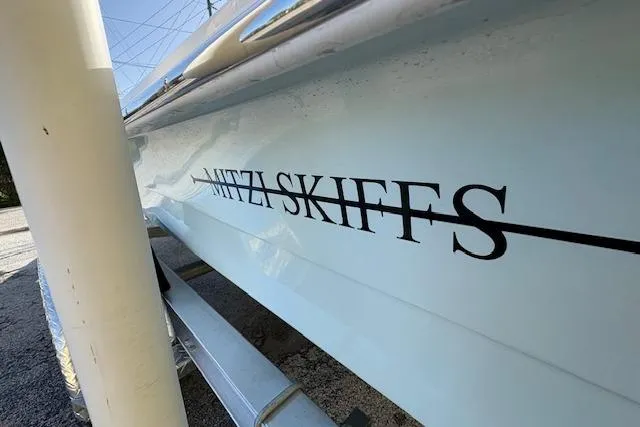 Slide: The Image of 2026 Mitzi Skiffs 17 Tournament boat side view with logo in focus. - 9