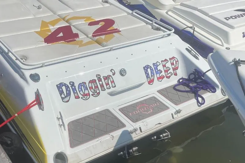 Slide: The Image of 2004 Fountain 42 Lightning boat with "Diggin' Deep" text on the stern. - 7